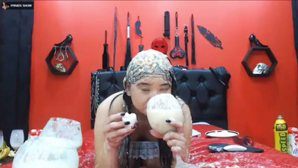 CHUGGING HER OWN PUKE