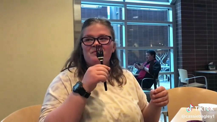 LADY ... HER FOOD UP