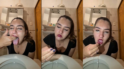 LATINA SLUT PUKING INTO HER TOILET BOWL