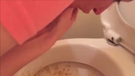 BELLY SHOWN AND PURGE IN THE TOILET..
