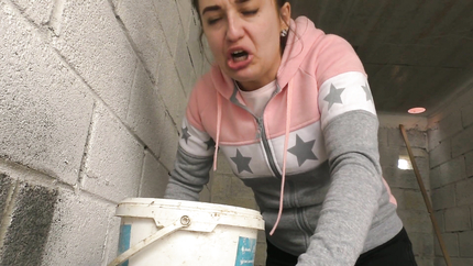 BRUNETTE LADY PUKES HERSELF IN THE BUCKET..
