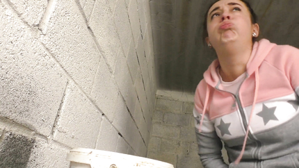 BRUNETTE LADY PUKES HERSELF IN THE BUCKET..