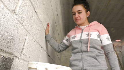 BRUNETTE LADY PUKES HERSELF IN THE BUCKET..