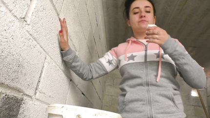 BRUNETTE LADY PUKES HERSELF IN THE BUCKET..