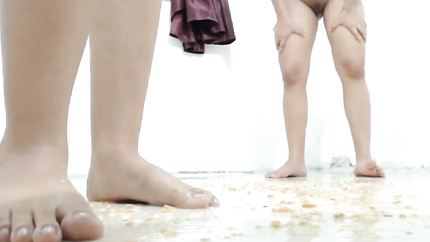 TWO LATINAS PUKING AND PISSING