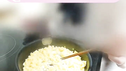 JAPANESE BABE POURS MILK FOR HER CEREAL
