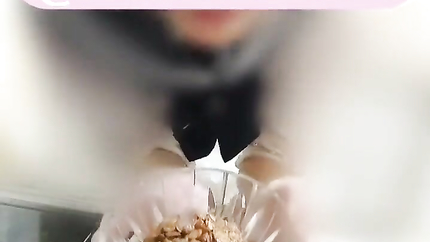 JAPANESE BABE POURS MILK FOR HER CEREAL