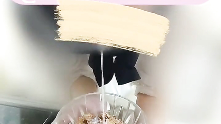 JAPANESE BABE POURS MILK FOR HER CEREAL