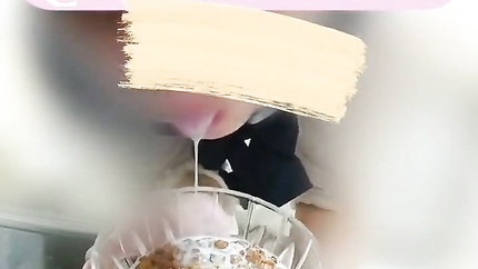 JAPANESE BABE POURS MILK FOR HER CEREAL