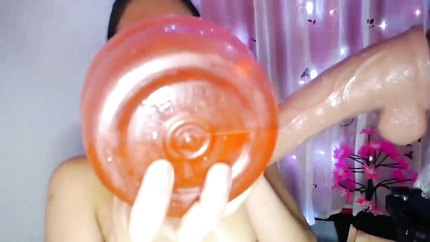 THROAT WHORE EXPLODES ON GIANT DILDO.