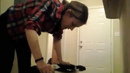 STEADY LADY PUKES IN THE TRASHCAN...