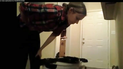 STEADY LADY PUKES IN THE TRASHCAN...