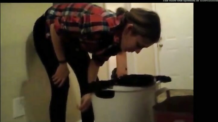 STEADY LADY PUKES IN THE TRASHCAN...