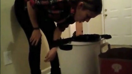 STEADY LADY PUKES IN THE TRASHCAN...