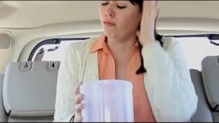WOMAN VOMITS IN CAR